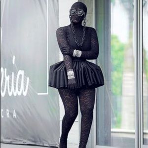 This custom made skirt by Yartelgh size 14 a little stretch